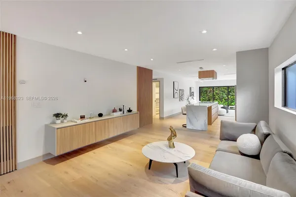 a living room with furniture and a table