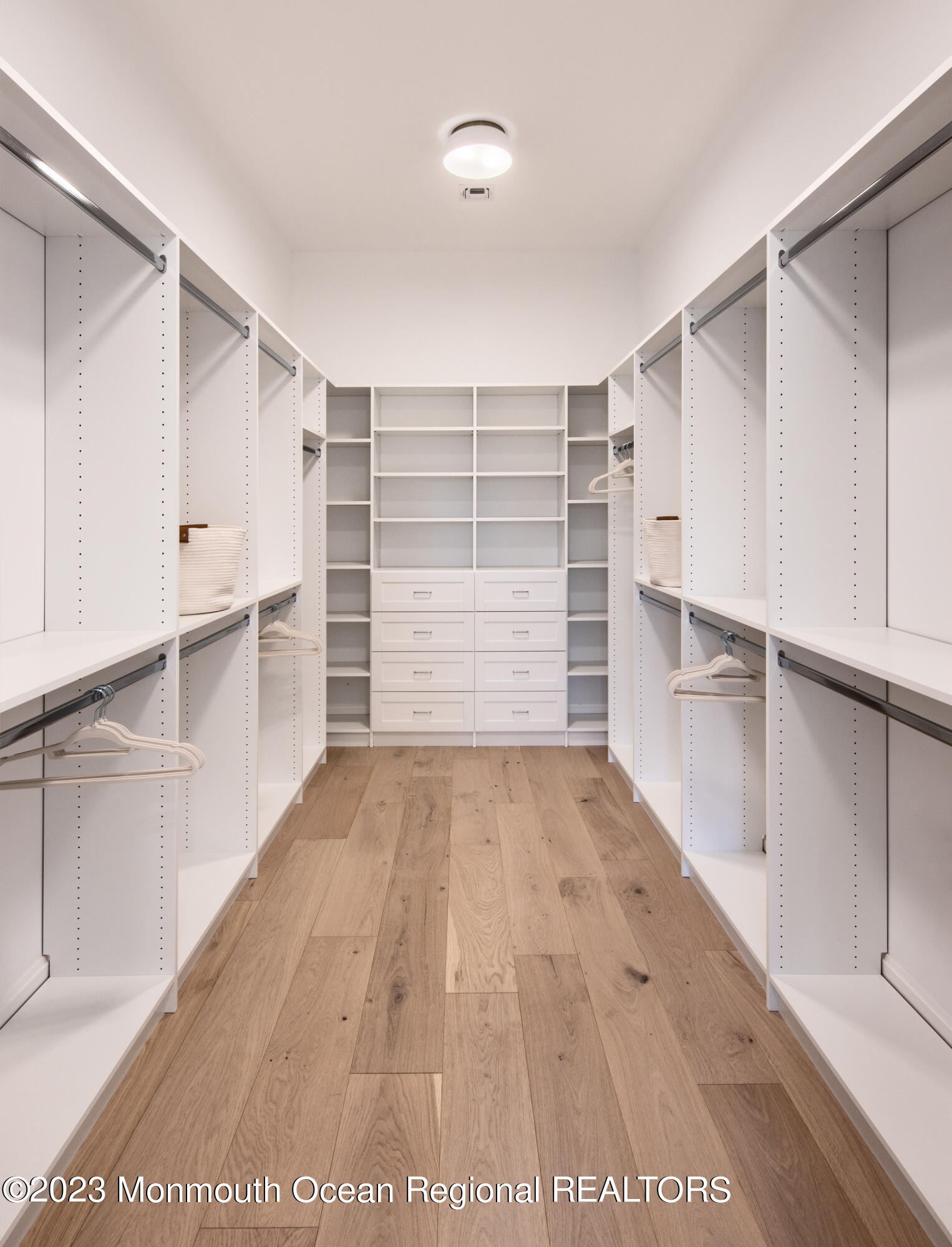7 Bingham Avenue Rumson, NJ 07760 - Photo 9 of 14 a view of walk in closet with empty racks