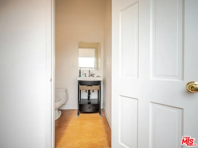 a bathroom with a sink toilet and tub
