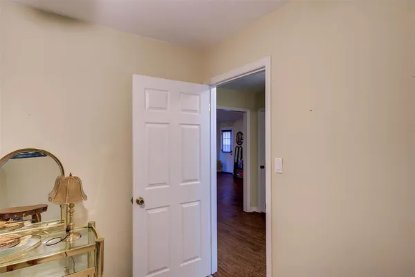a view of a bedroom from the hallway