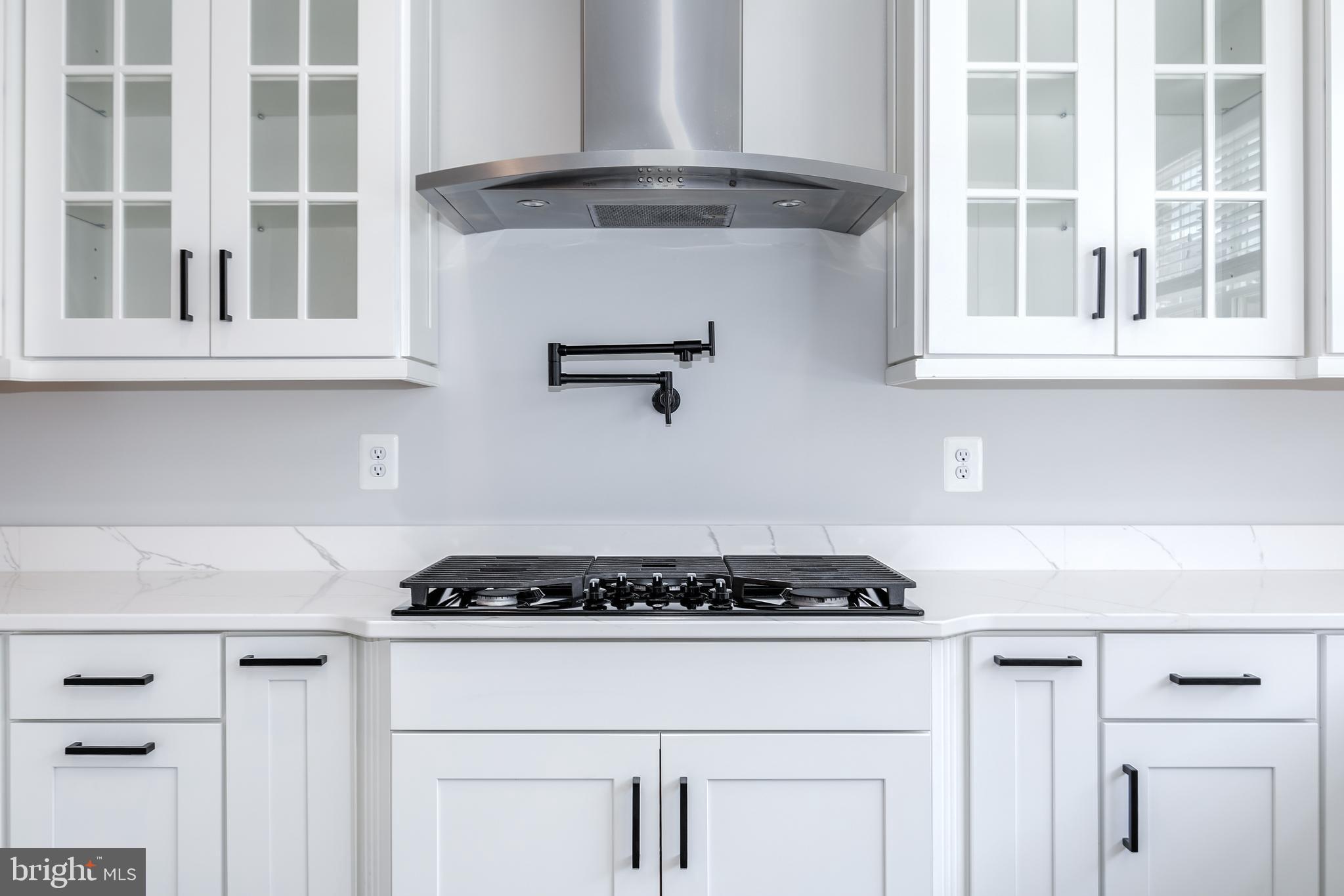 620 Leigh Wy. Oxon Hill, MD 20745 - Photo 6 of 33 Wall Mount Pot Filler, 5 Burner Gas Cooktop