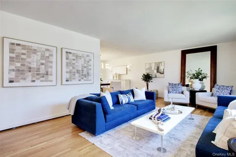 a view of a dining room with furniture and window