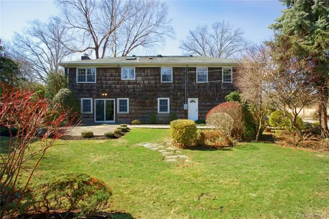 a view of a house with a swimming pool