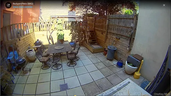 a view of an outdoor space with sitting area