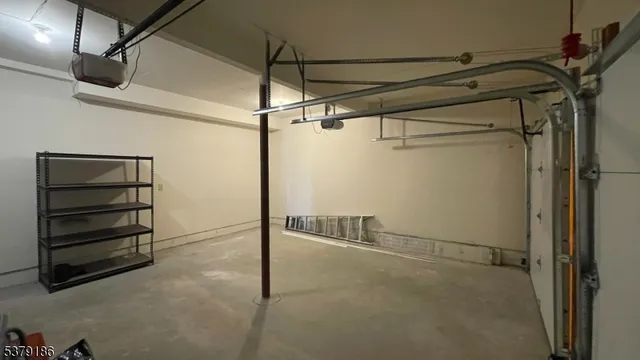 a view of a swimming pool with a lounge chair