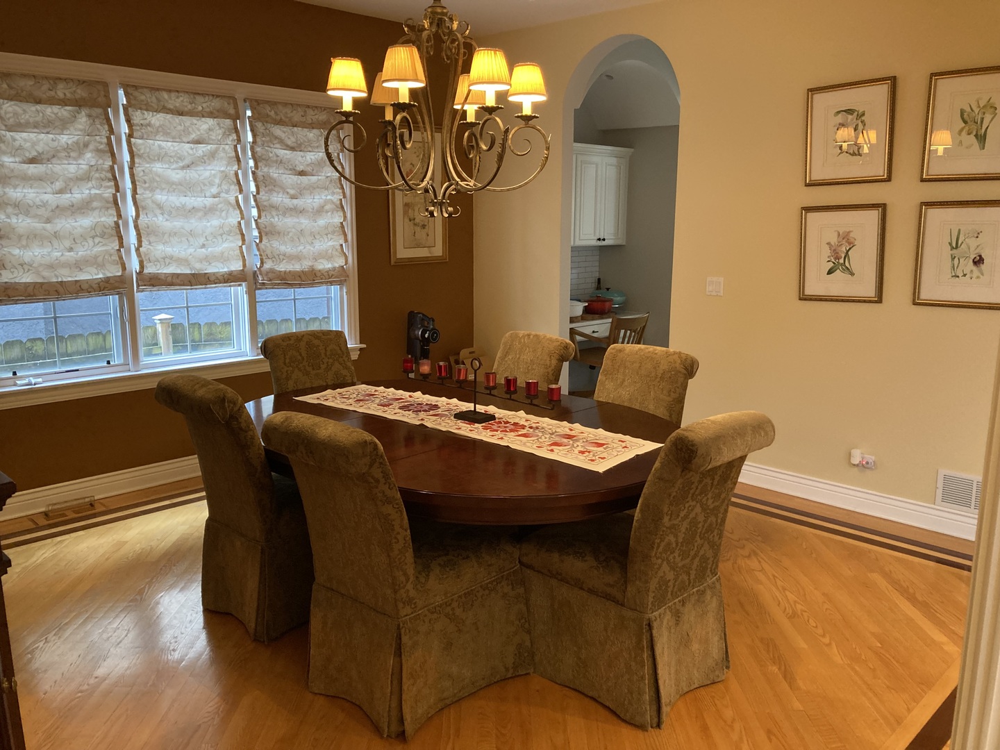 8619 West Sunset Road Niles, IL 60714 - Photo 13 of 37 a living room with furniture and a chandelier