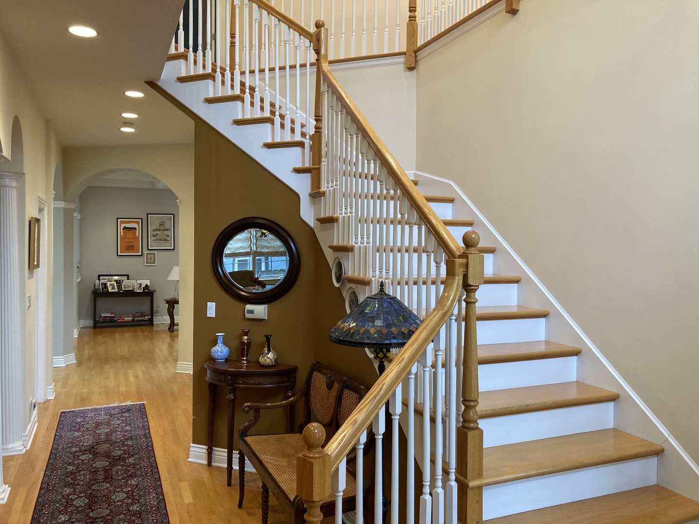 8619 West Sunset Road Niles, IL 60714 - Photo 15 of 37 a view of entryway livingroom and hall with wooden floor