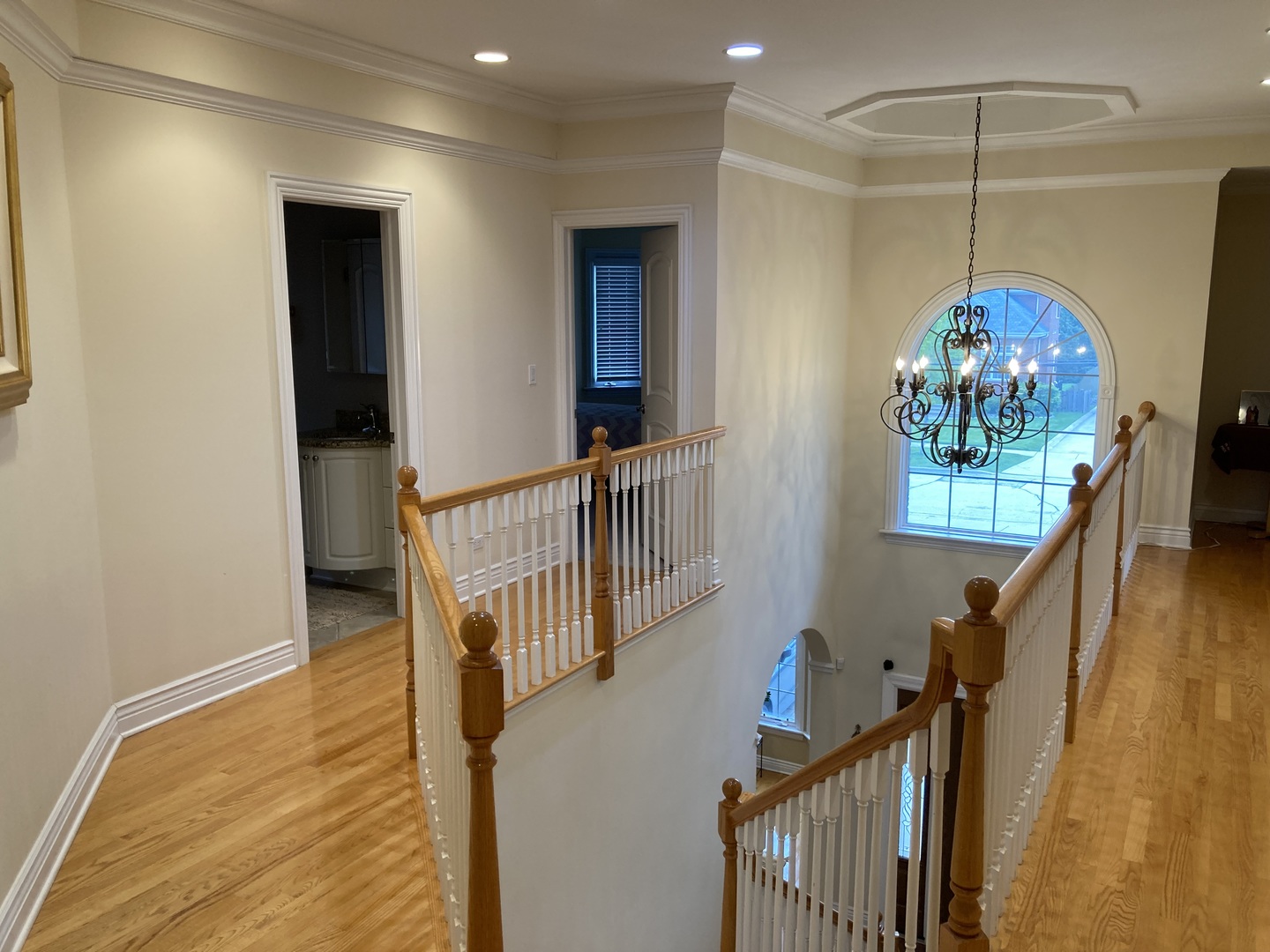 8619 West Sunset Road Niles, IL 60714 - Photo 16 of 37 a view of entryway and hall with wooden floor