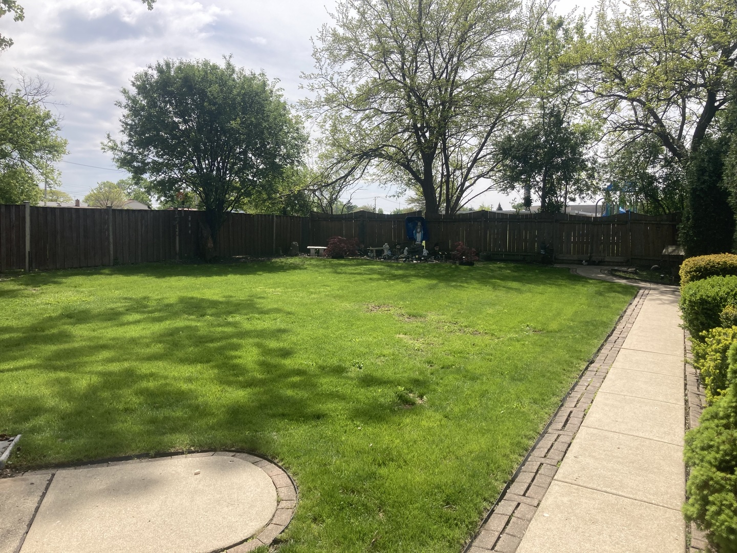 8619 West Sunset Road Niles, IL 60714 - Photo 32 of 37 a view of a backyard with green space