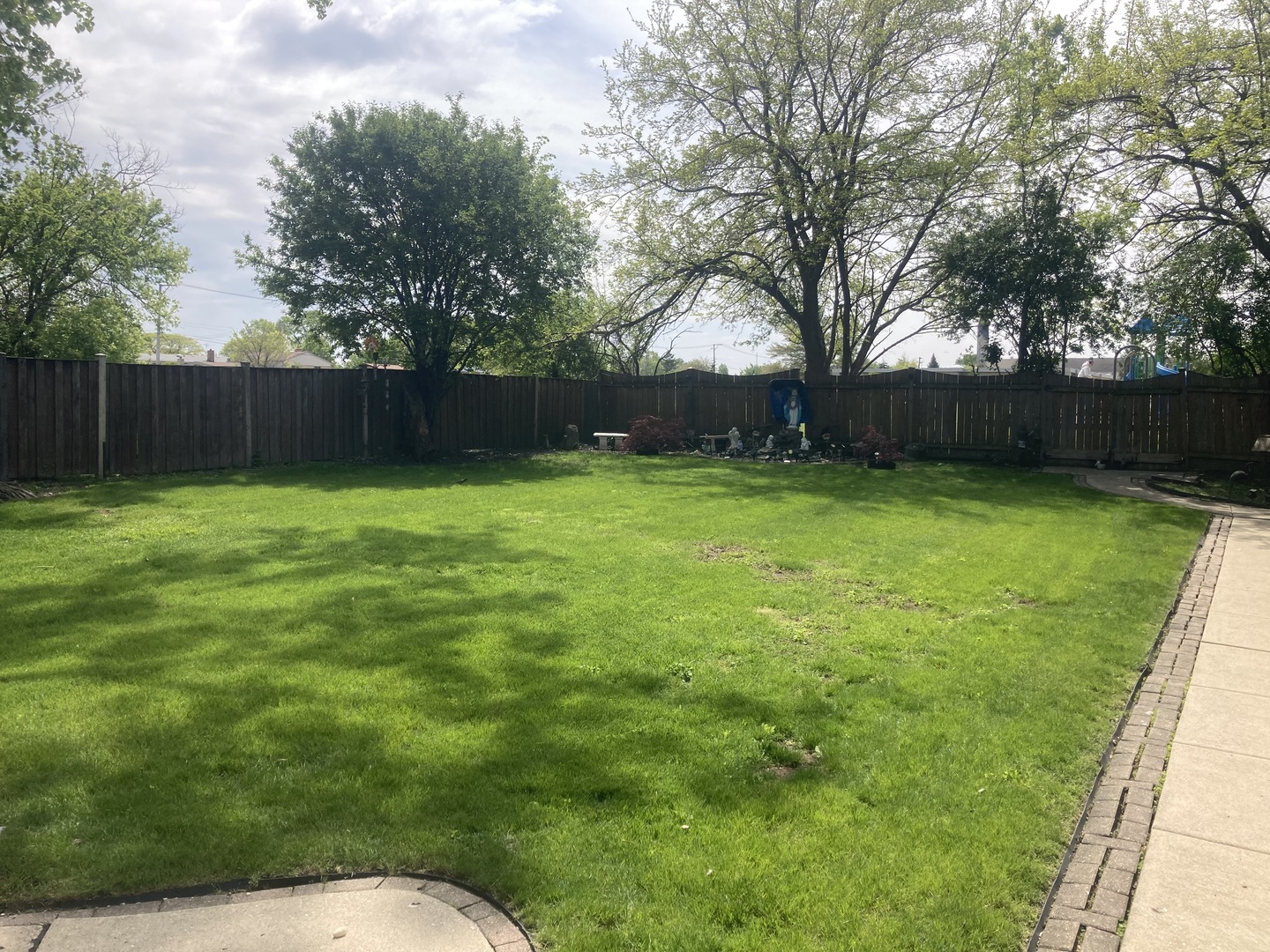 8619 West Sunset Road Niles, IL 60714 - Photo 33 of 37 a view of swimming pool with a backyard