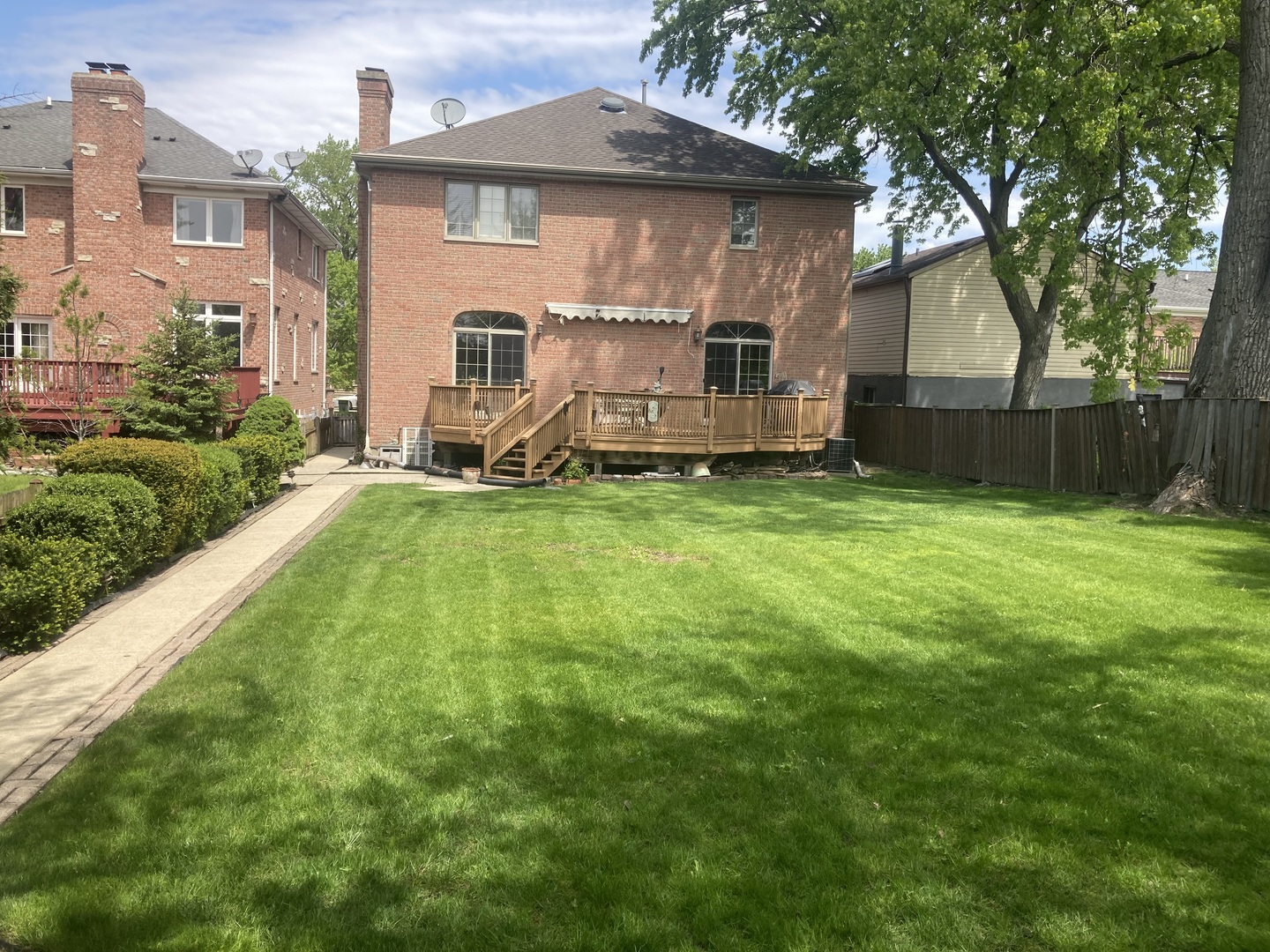 8619 West Sunset Road Niles, IL 60714 - Photo 34 of 37 a view of a house with backyard