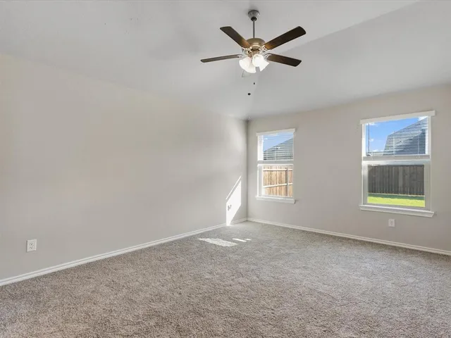 a kitchen with stainless steel appliances granite countertop a sink stove and microwave