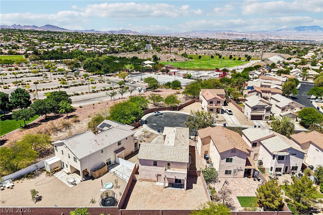 1176 Butternut Ranch Court Henderson, NV 89052 - Photo 50 of 60 Perched above a vibrant community, this property offers elevated views of the neighborhood's recreational amenities.