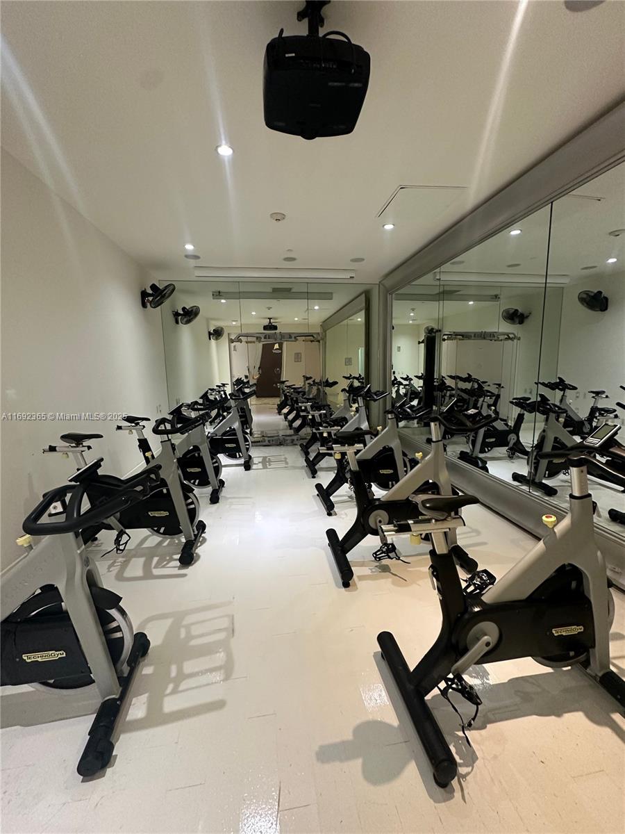 495 Brickell Avenue, Unit 4103 Miami, FL 33131 - Photo 16 of 27 a view of a room with gym equipment