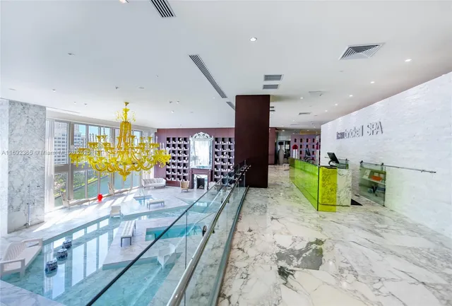 a view of a living room and entryway