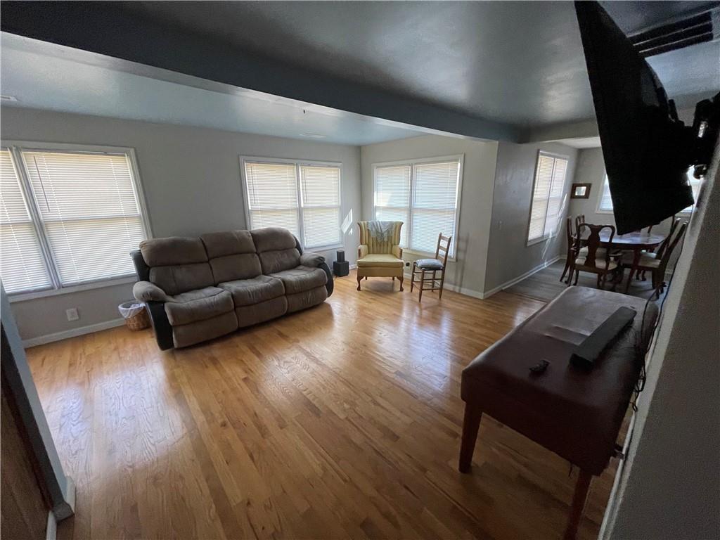 71 McGuire Road Dallas, GA 30157 - Photo 8 of 15 a living room with furniture and a wooden floor
