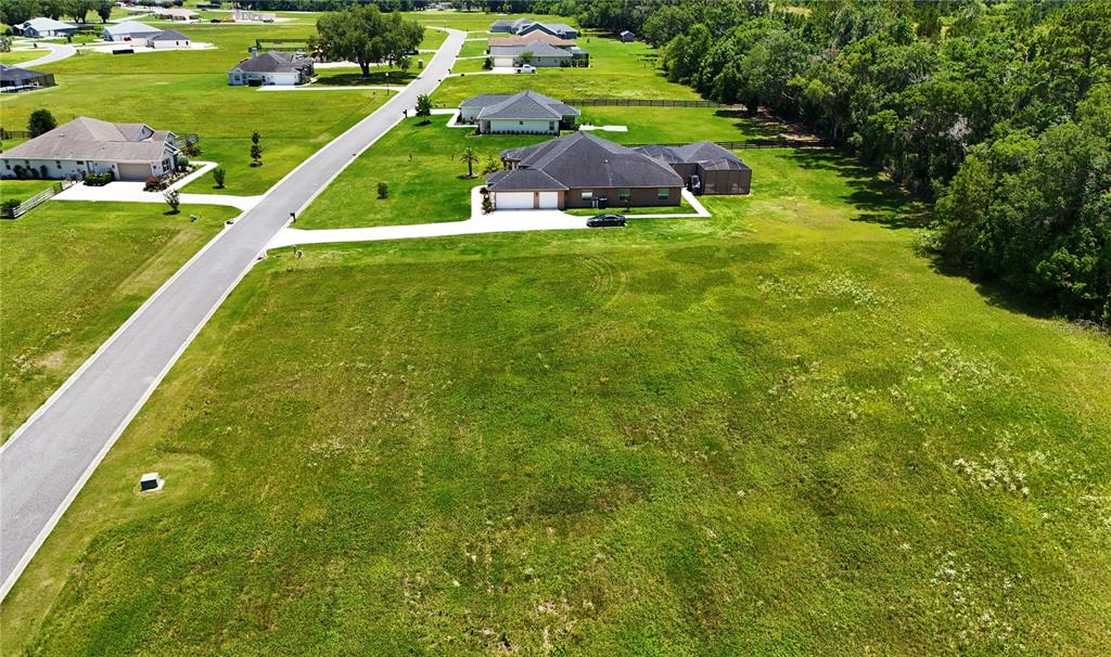 32 Northwest 79th Loop Ocala, FL 34475 - Photo 5 of 8 a view of an outdoor space and a lake view
