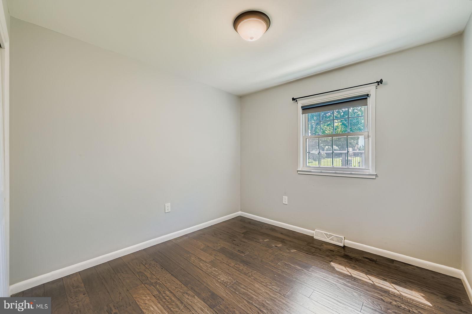 6205 Ridgeview Avenue Baltimore, MD 21206 - Photo 11 of 34 an empty room with a workspace