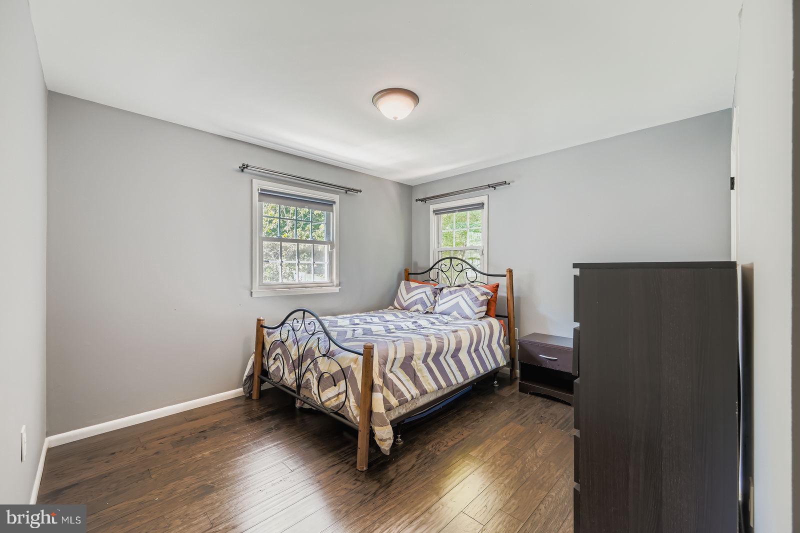 6205 Ridgeview Avenue Baltimore, MD 21206 - Photo 9 of 34 a bedroom with a bed and a window