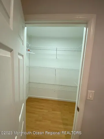 a bathroom with a shower and toilet