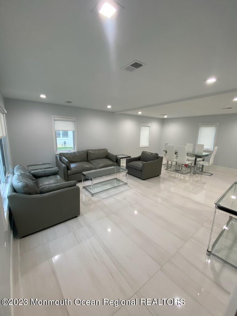 259 Norgrove Avenue Long Branch, NJ 07740 - Photo 7 of 11 a large living room with furniture