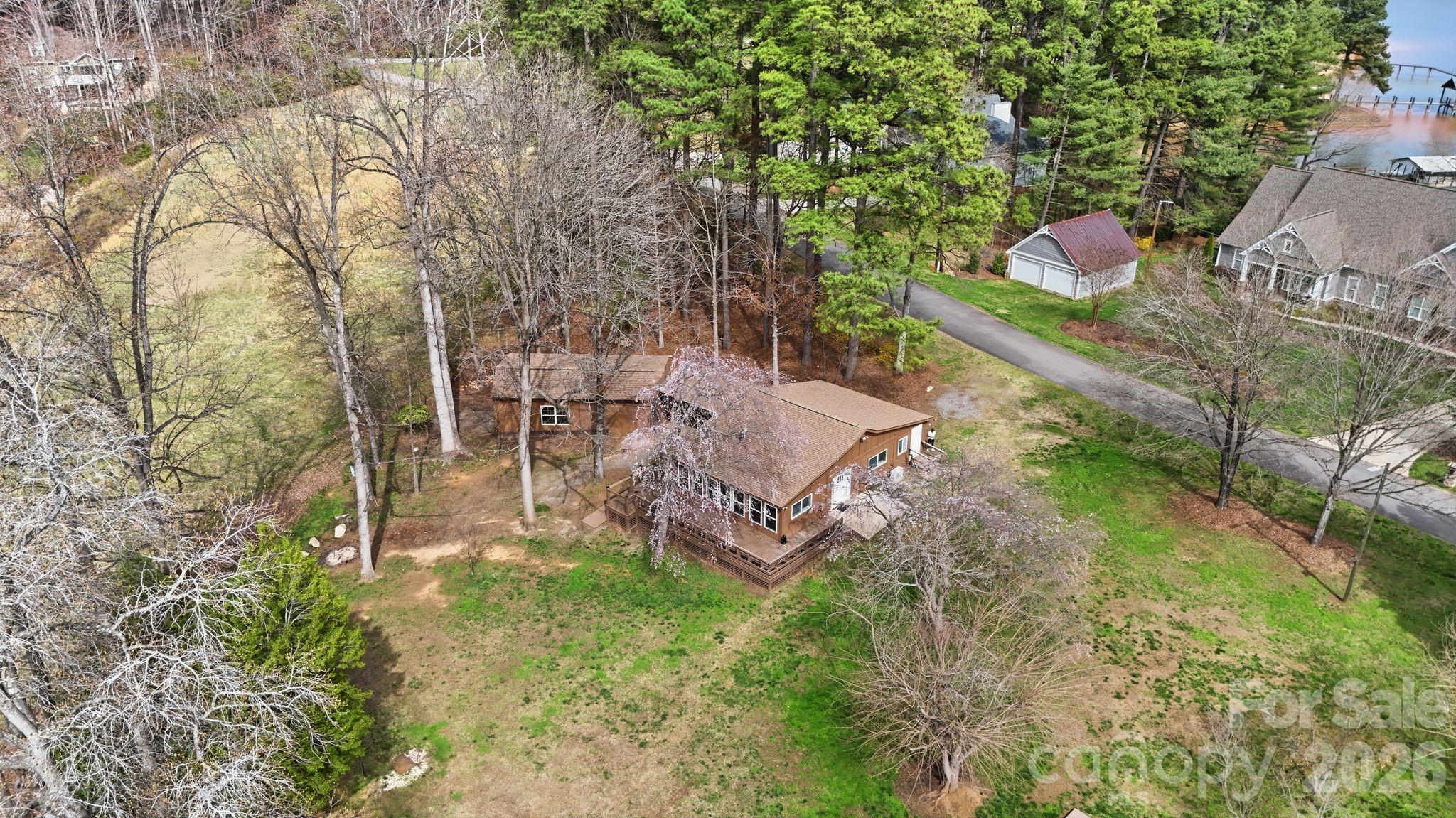 232 Apache Road Troutman, NC 28166 - Photo 16 of 25 a backyard of a house with lots of green space