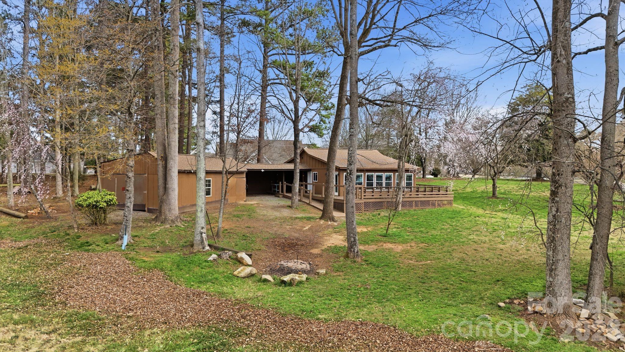 232 Apache Road Troutman, NC 28166 - Photo 17 of 25 a view of a house with a yard