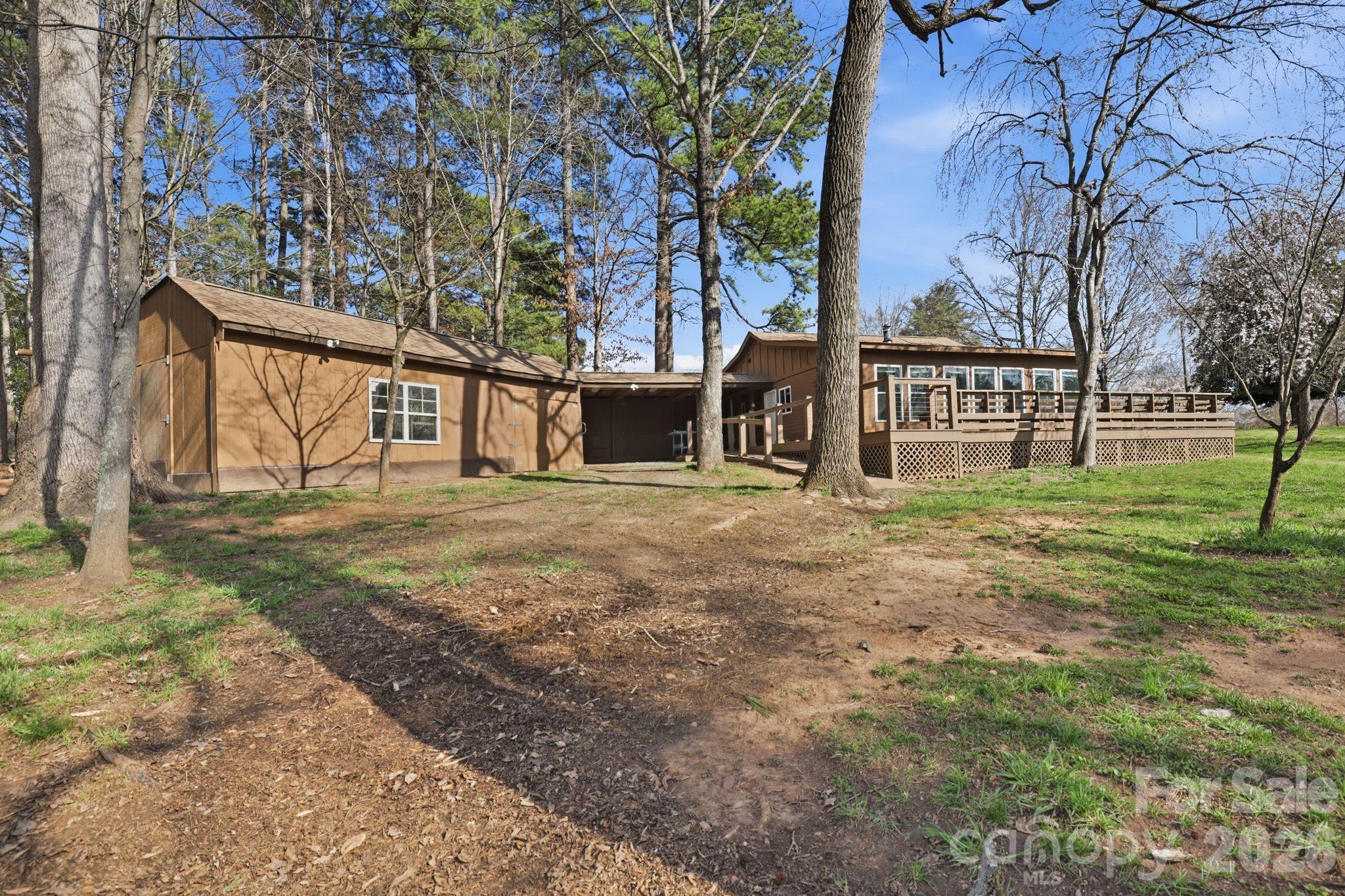 232 Apache Road Troutman, NC 28166 - Photo 20 of 25 a view of a house with a yard