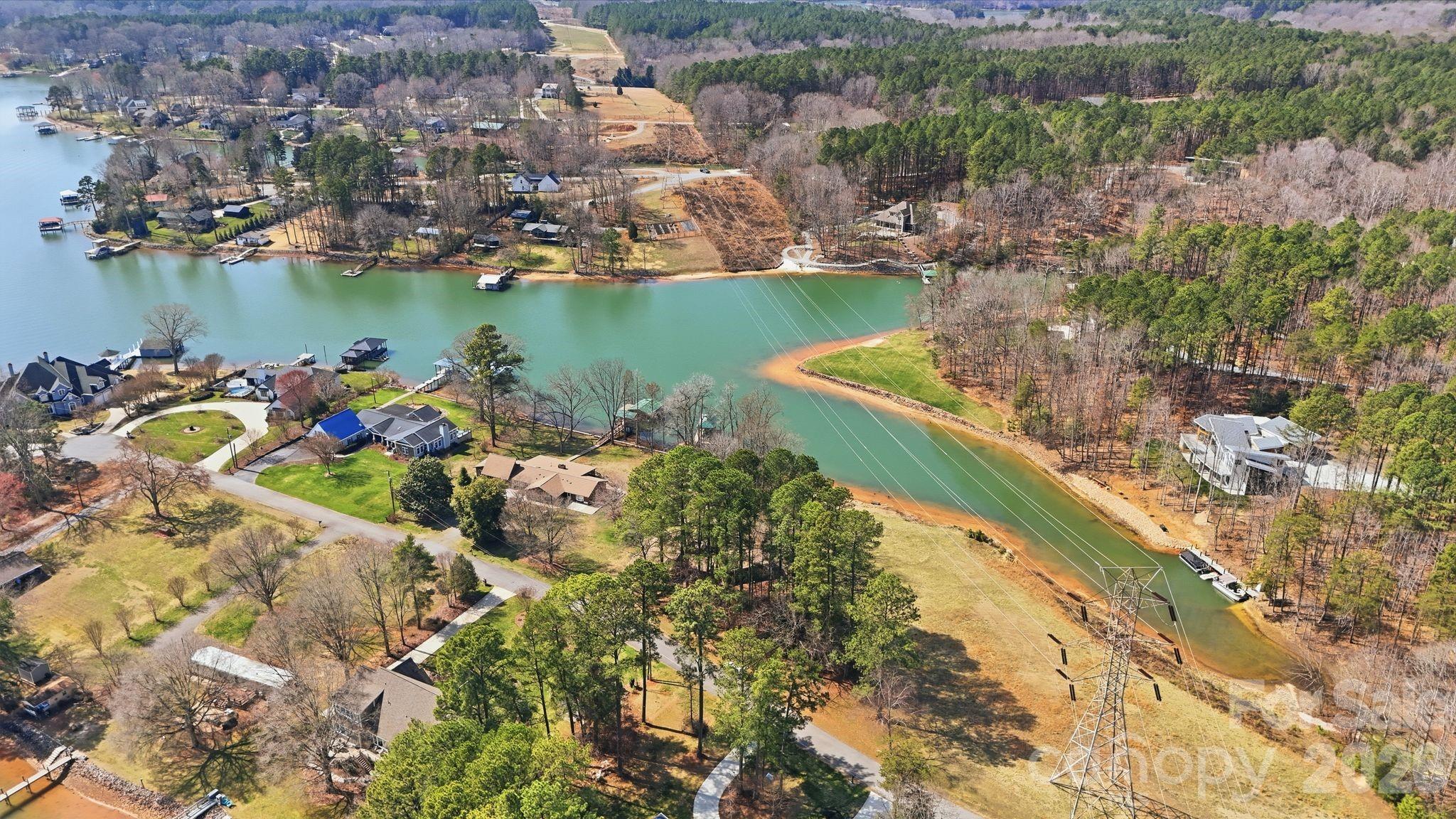 232 Apache Road Troutman, NC 28166 - Photo 23 of 25 a view of a lake with a mountain in the background