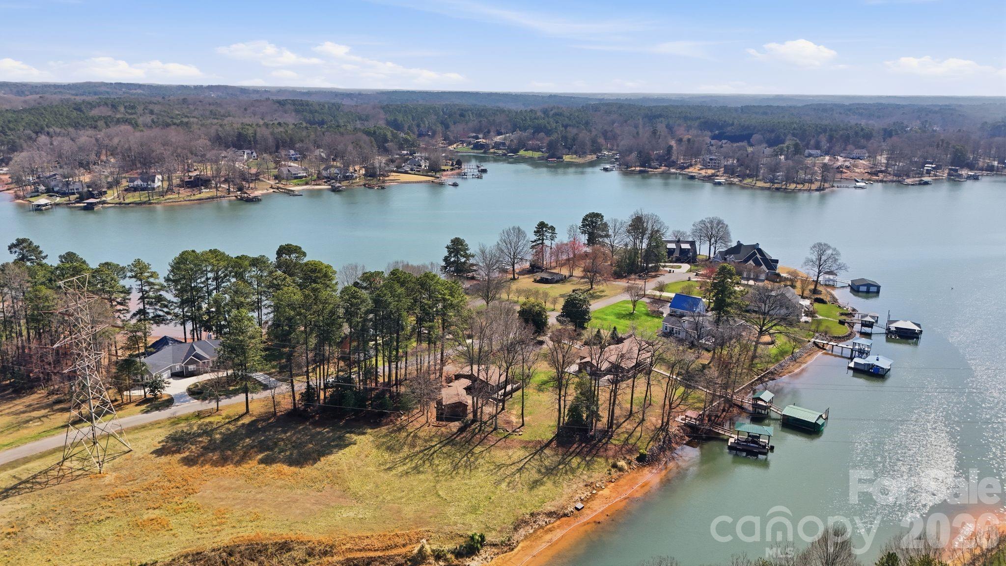 232 Apache Road Troutman, NC 28166 - Photo 25 of 25 an aerial view of a houses with a lake view