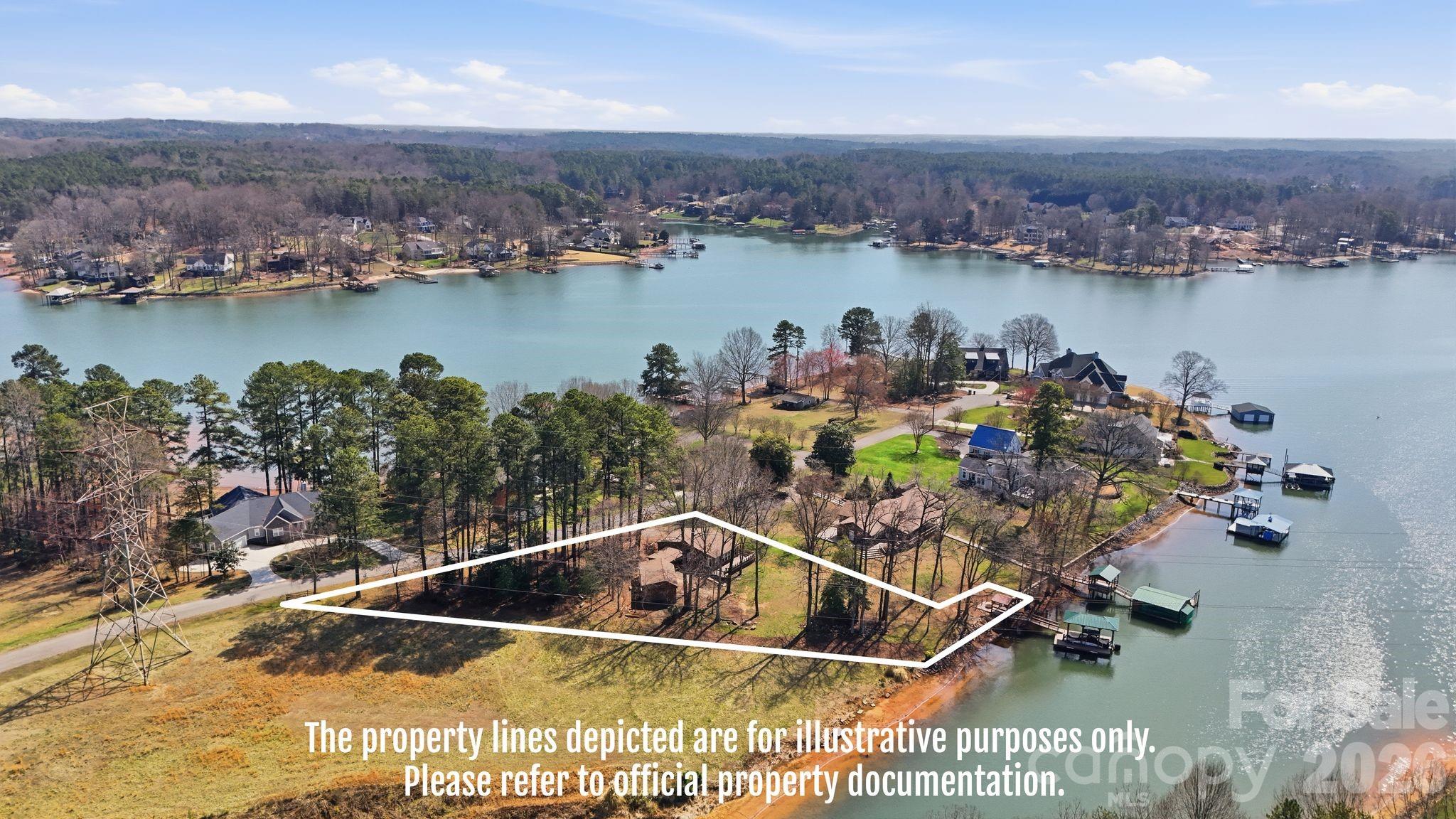 232 Apache Road Troutman, NC 28166 - Photo 5 of 25 an aerial view of a house with swimming pool and lake view