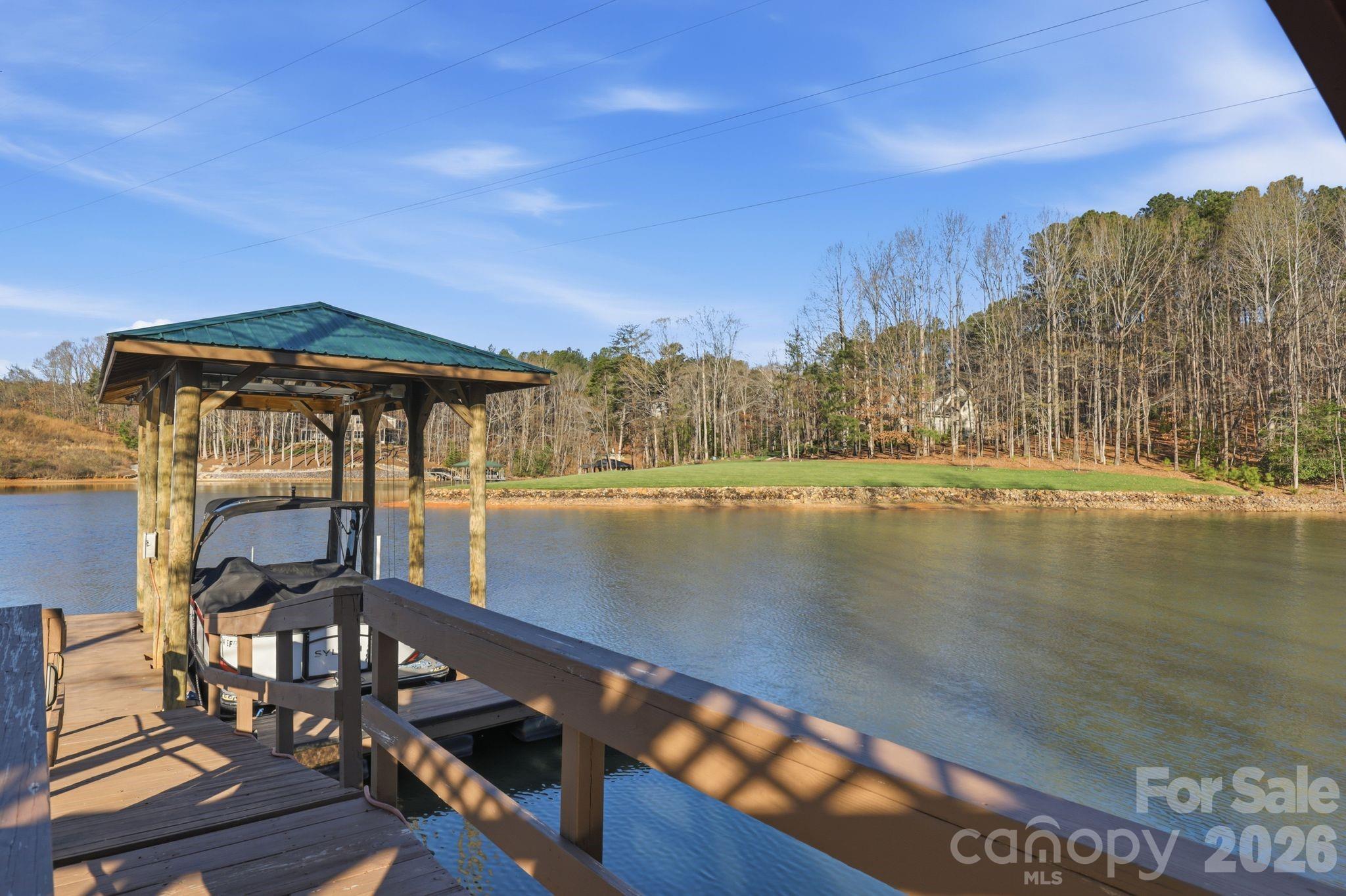232 Apache Road Troutman, NC 28166 - Photo 10 of 25 a view of a lake with a mountain view