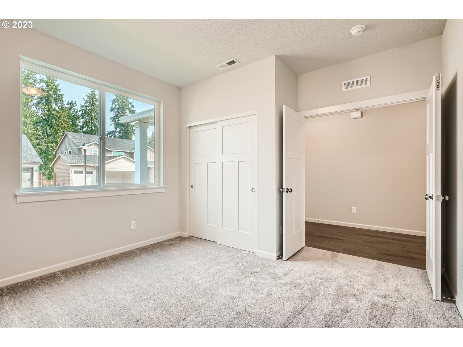 2816 South 7th Circle Ridgefield, WA 98642 - Photo 6 of 25 a view of an empty room with a window
