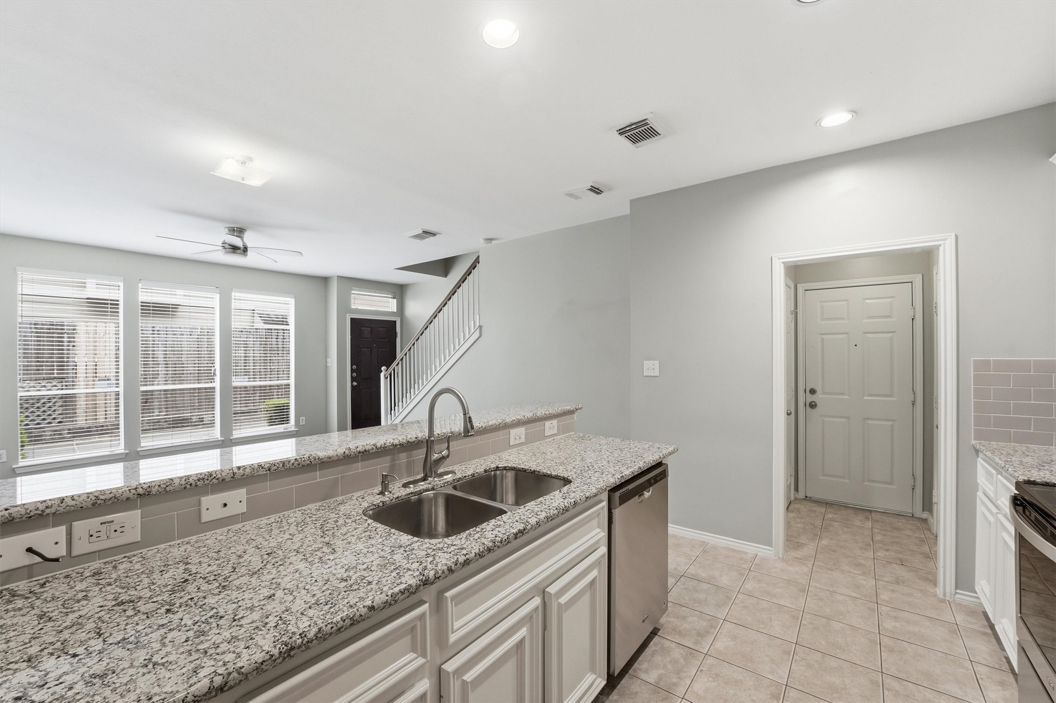 1507 Sutton Street Houston, TX 77006 - Photo 9 of 31 a kitchen with stainless steel appliances granite countertop a sink and a granite counter tops