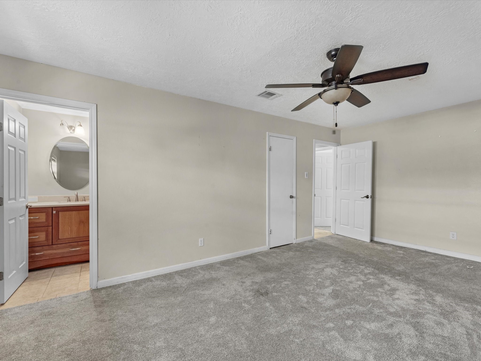 4318 Ponca Street Pasadena, TX 77504 - Photo 13 of 22 a view of an empty room and closet area