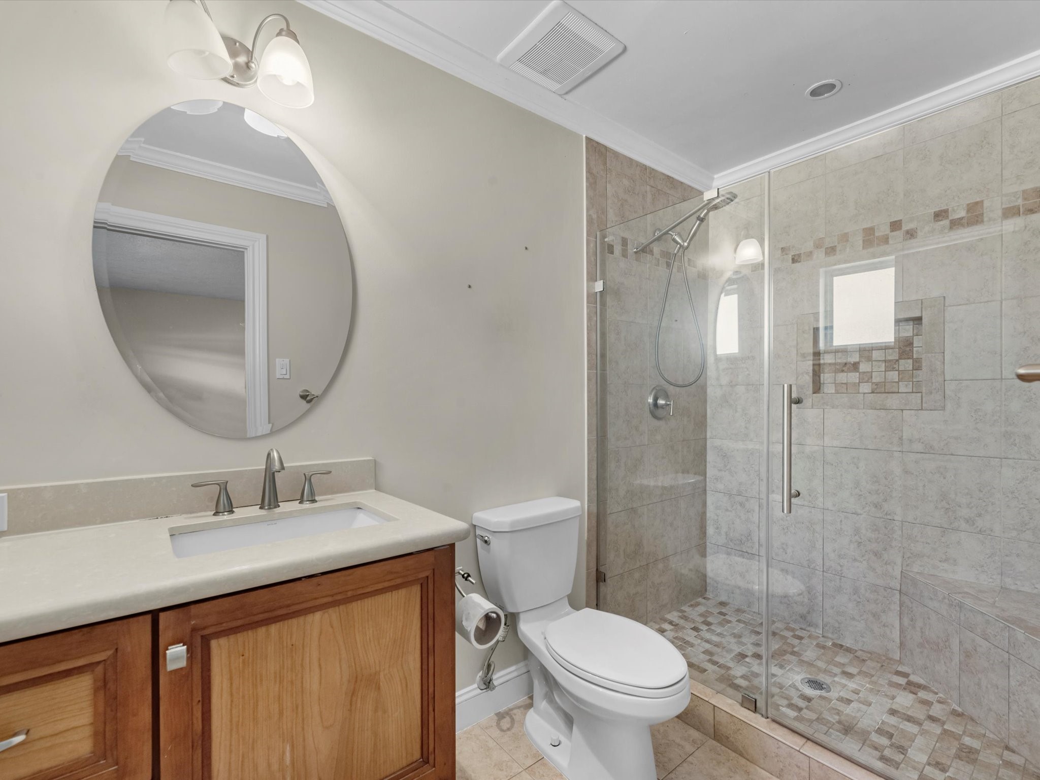 4318 Ponca Street Pasadena, TX 77504 - Photo 14 of 22 a bathroom with a sink toilet and shower