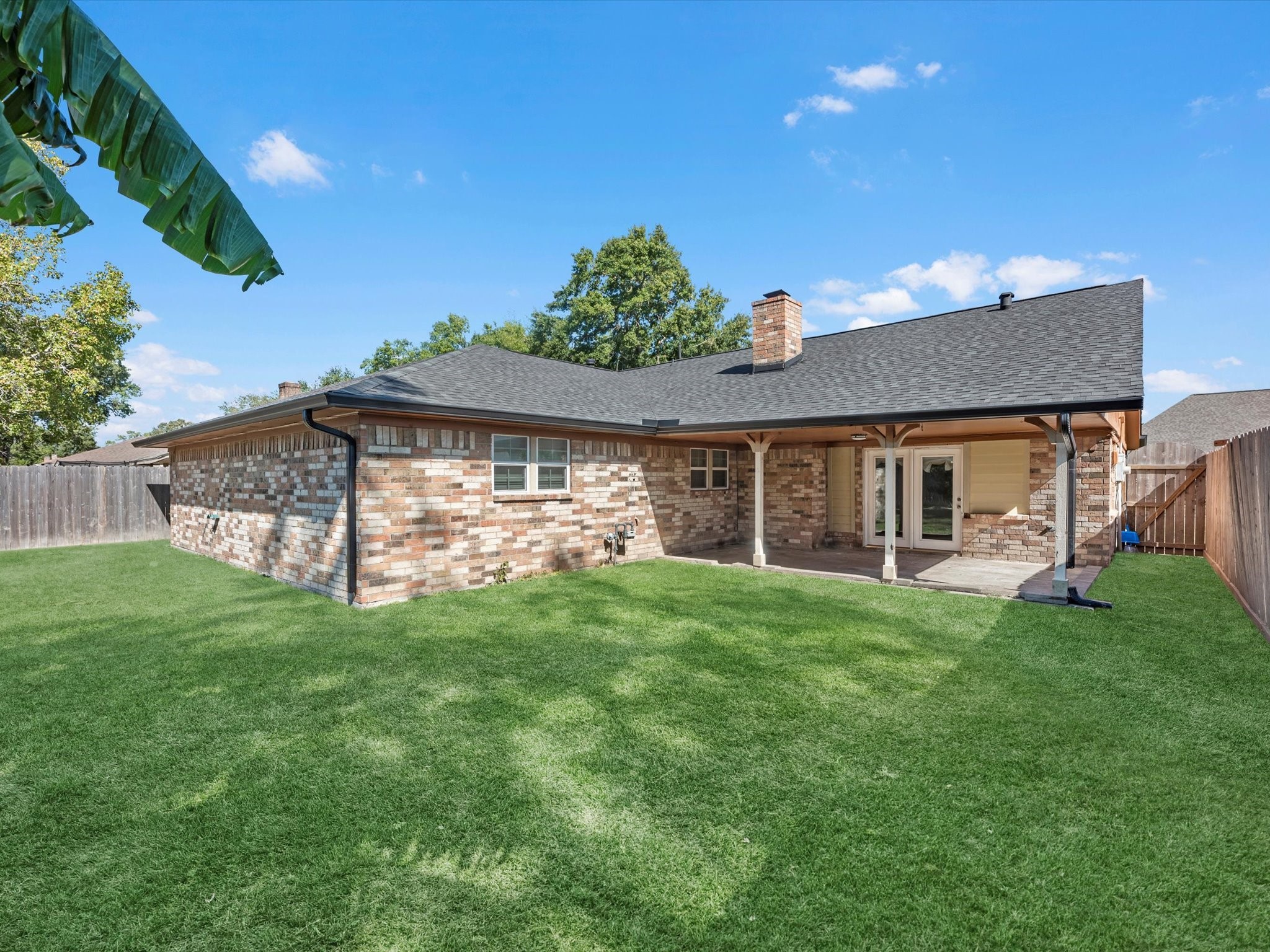 4318 Ponca Street Pasadena, TX 77504 - Photo 21 of 22 a front view of a house with a garden