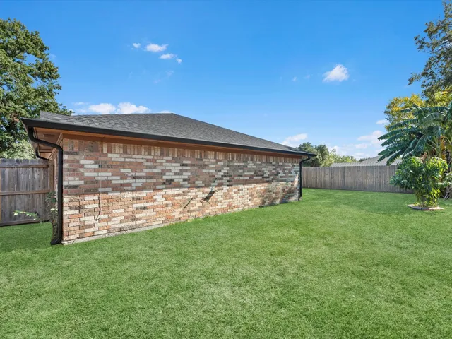 a view of a backyard with a garden