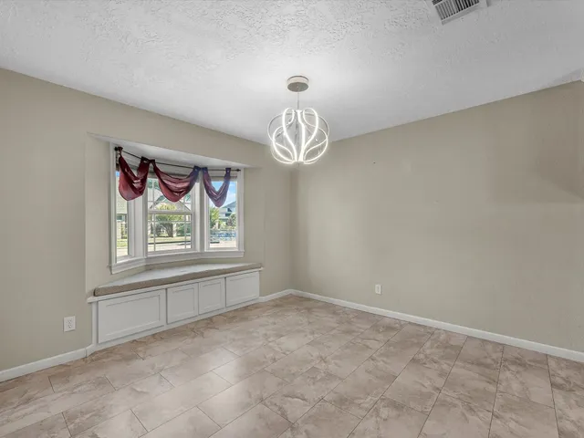 a view of empty room with window