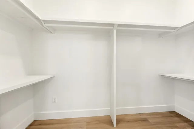a view of an empty walk in closet