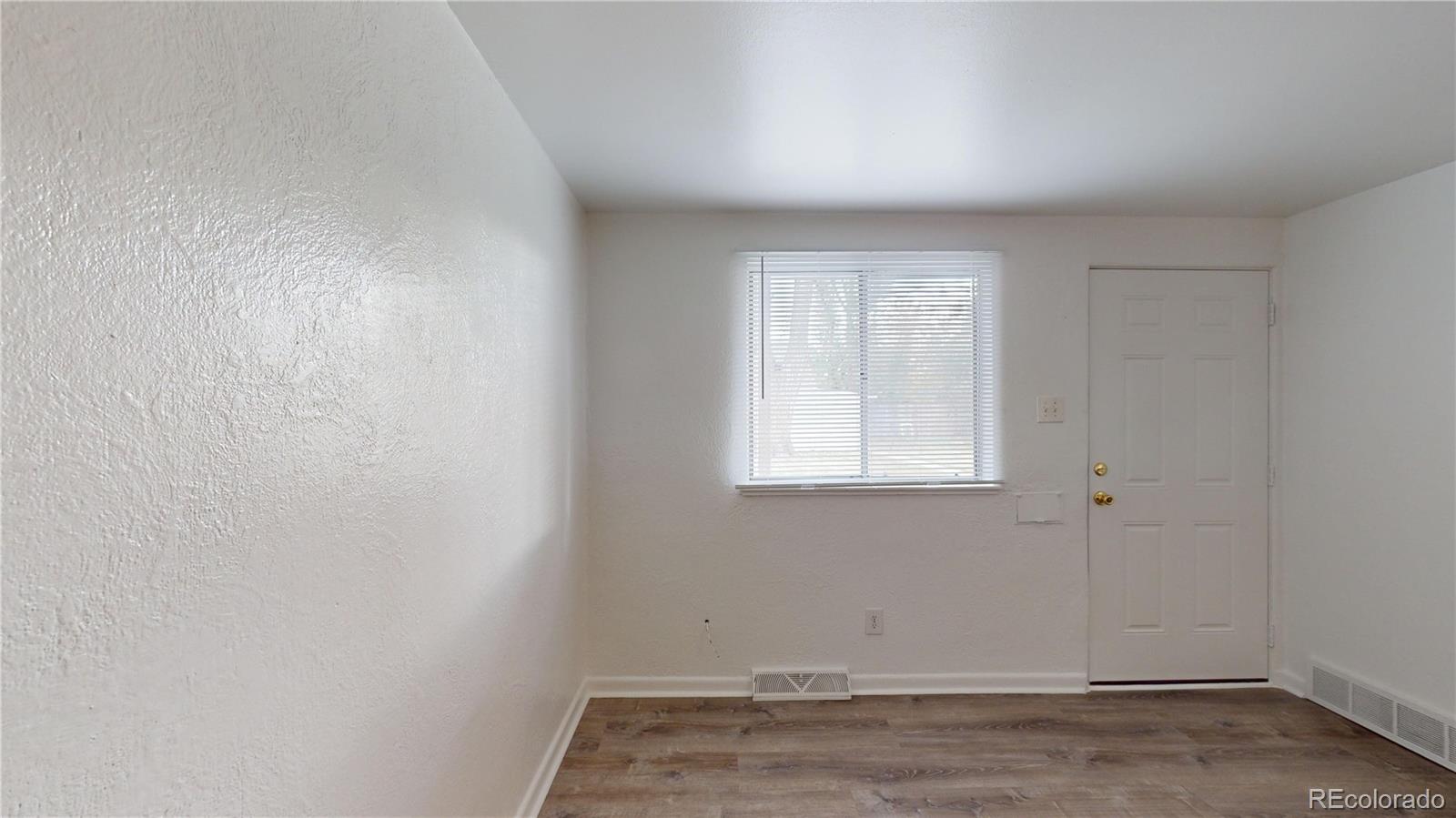 1251 Upham Street, Unit 8 Lakewood, CO 80214 - Photo 23 of 38 a view of a room that has a window in it