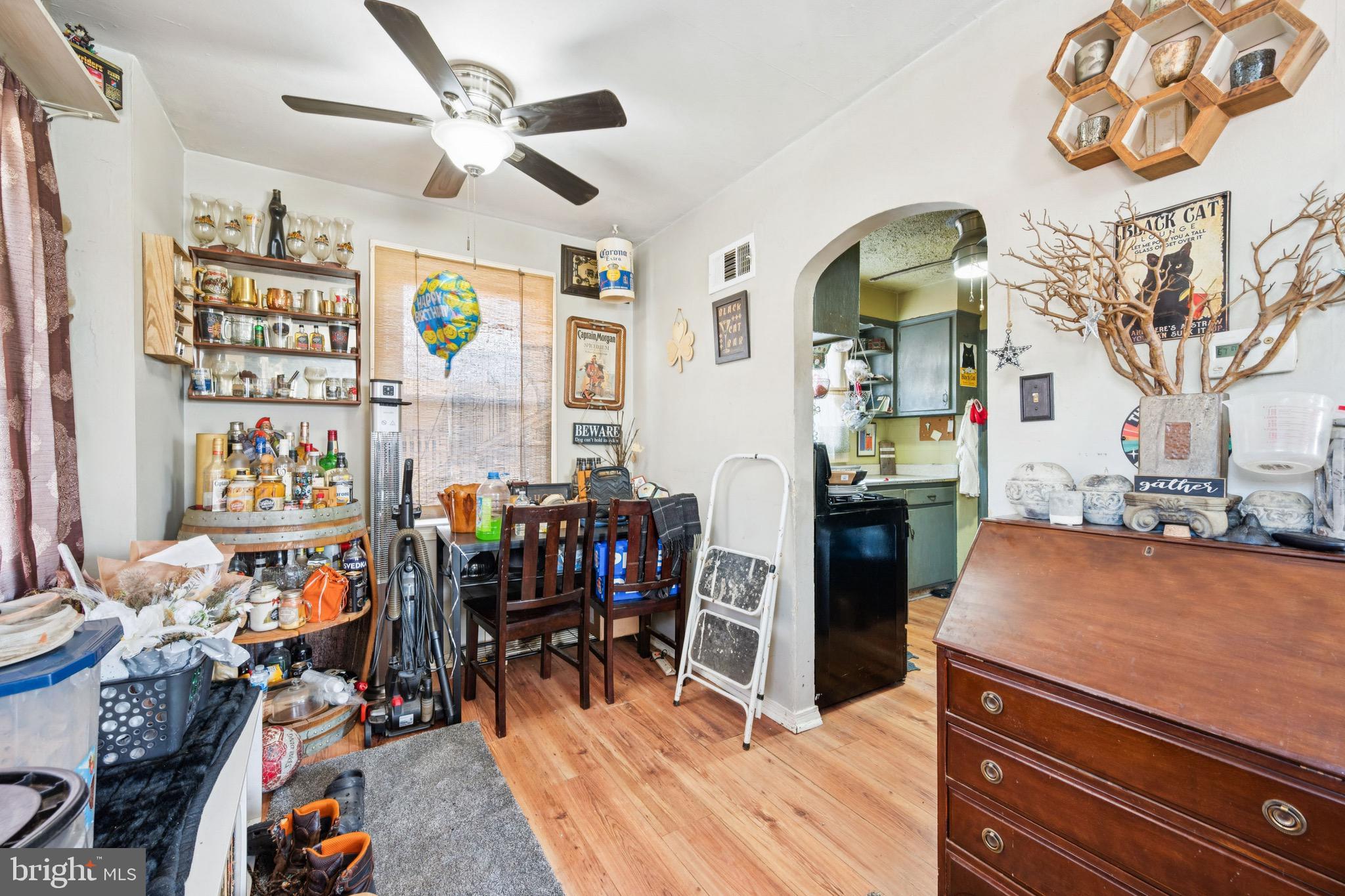 728 Haverford Avenue Maple Shade, NJ 08052 - Photo 11 of 17 a living room filled with furniture and a chandelier