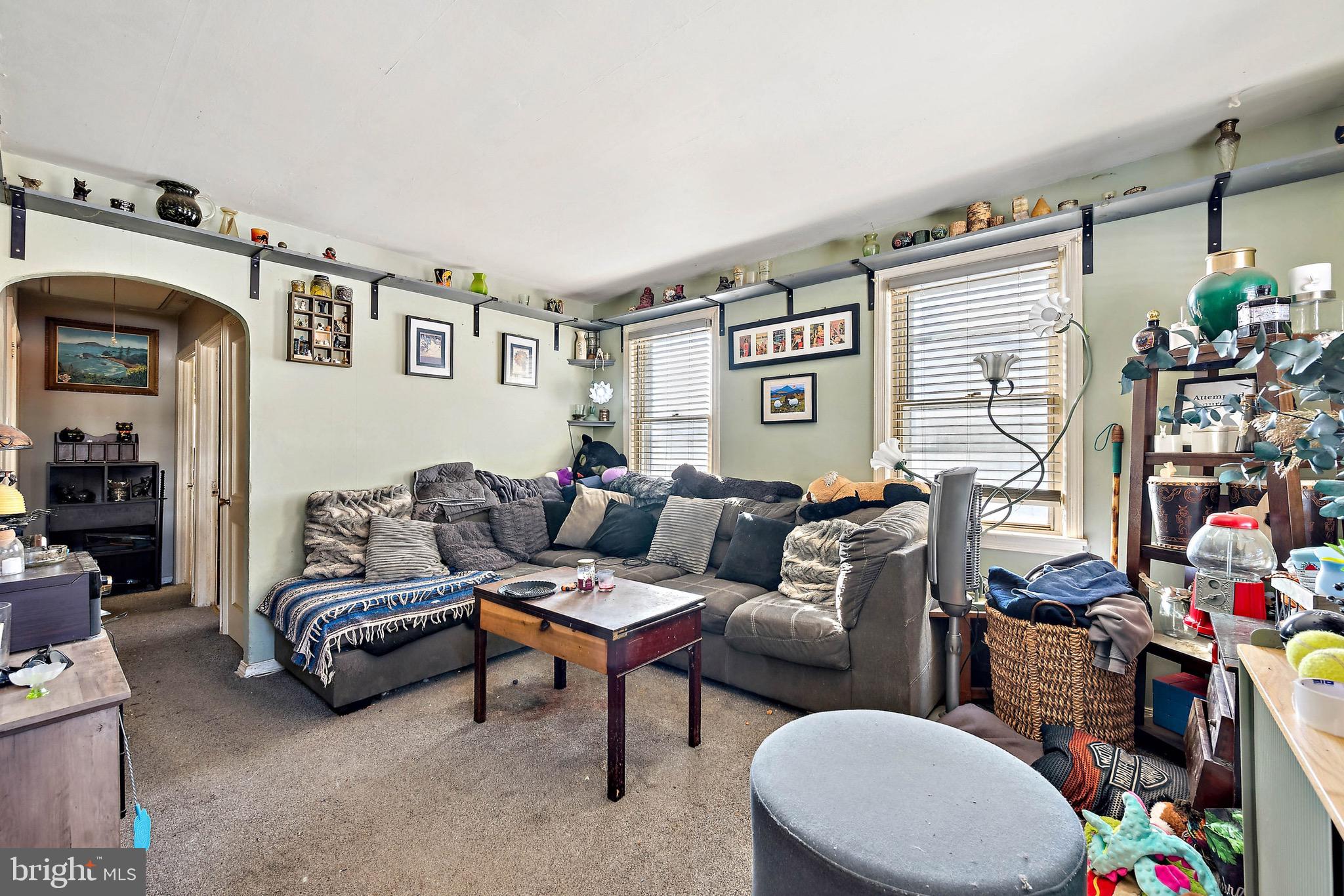 728 Haverford Avenue Maple Shade, NJ 08052 - Photo 13 of 17 a living room with furniture and a window