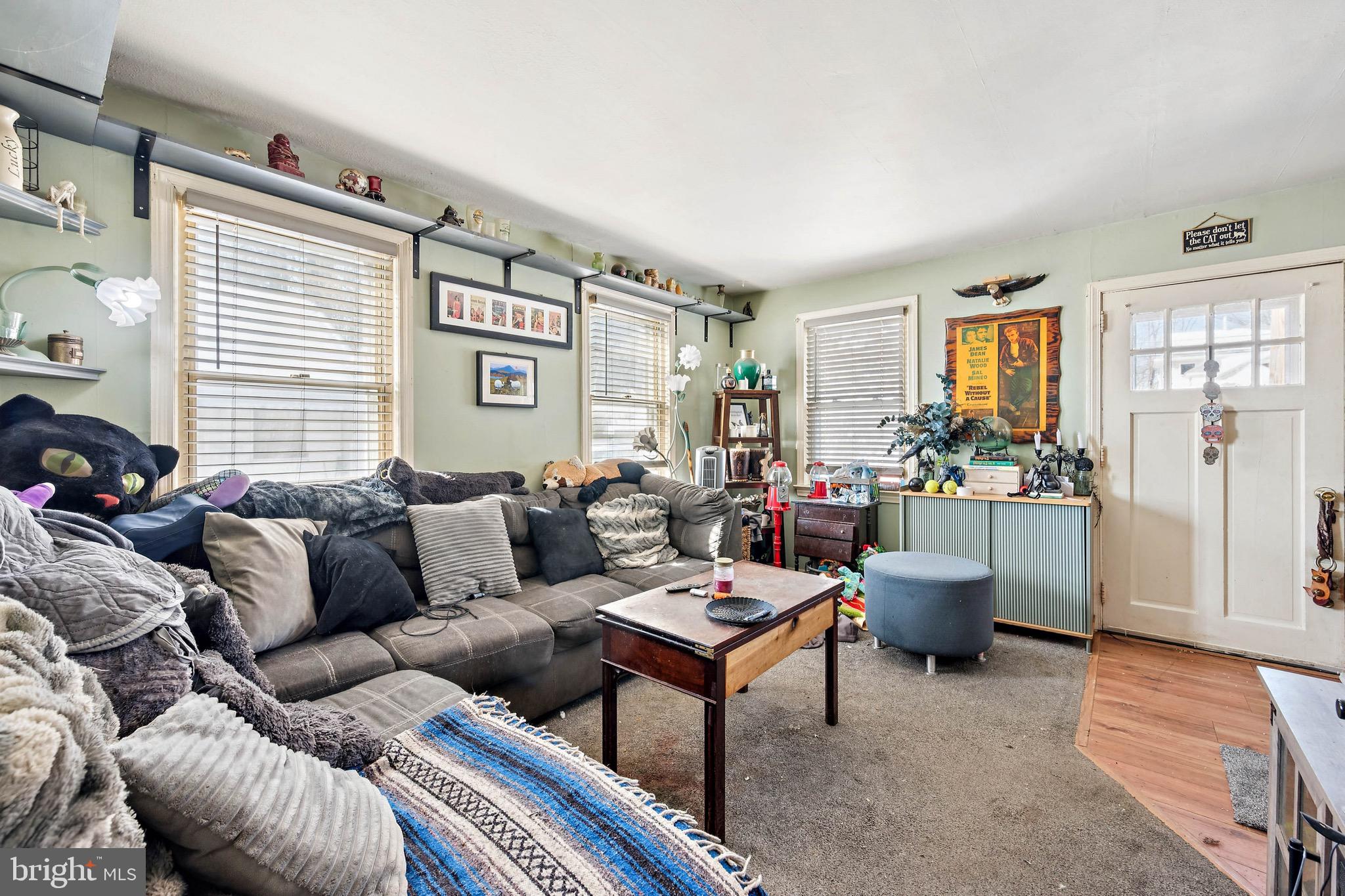 728 Haverford Avenue Maple Shade, NJ 08052 - Photo 15 of 17 a living room with furniture or couch and a window
