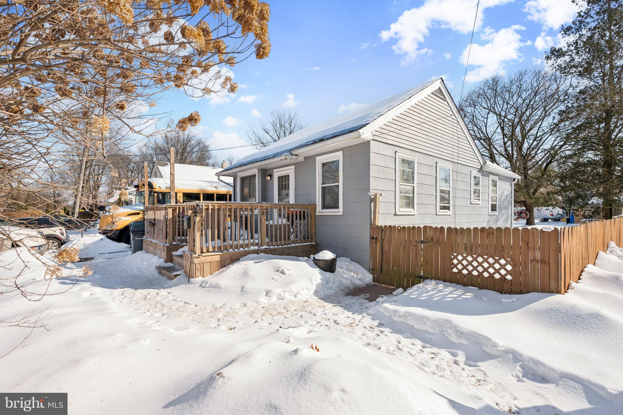 728 Haverford Avenue Maple Shade, NJ 08052 - Photo 3 of 17 a view of a house covered in snow