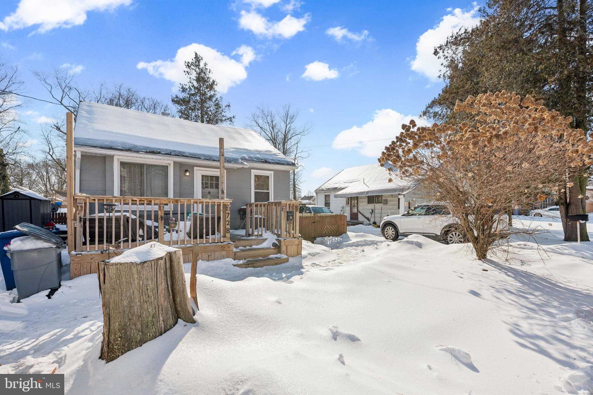 728 Haverford Avenue Maple Shade, NJ 08052 - Photo 5 of 17 a view of a house with snow on the road