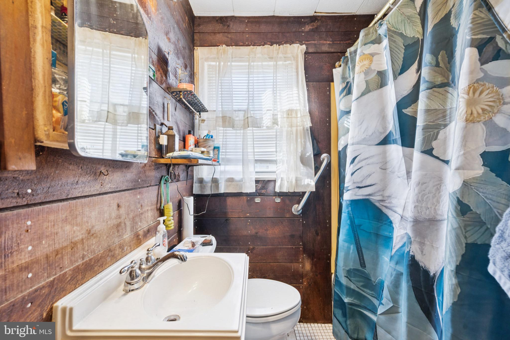 728 Haverford Avenue Maple Shade, NJ 08052 - Photo 8 of 17 a bathroom with a sink toilet and shower