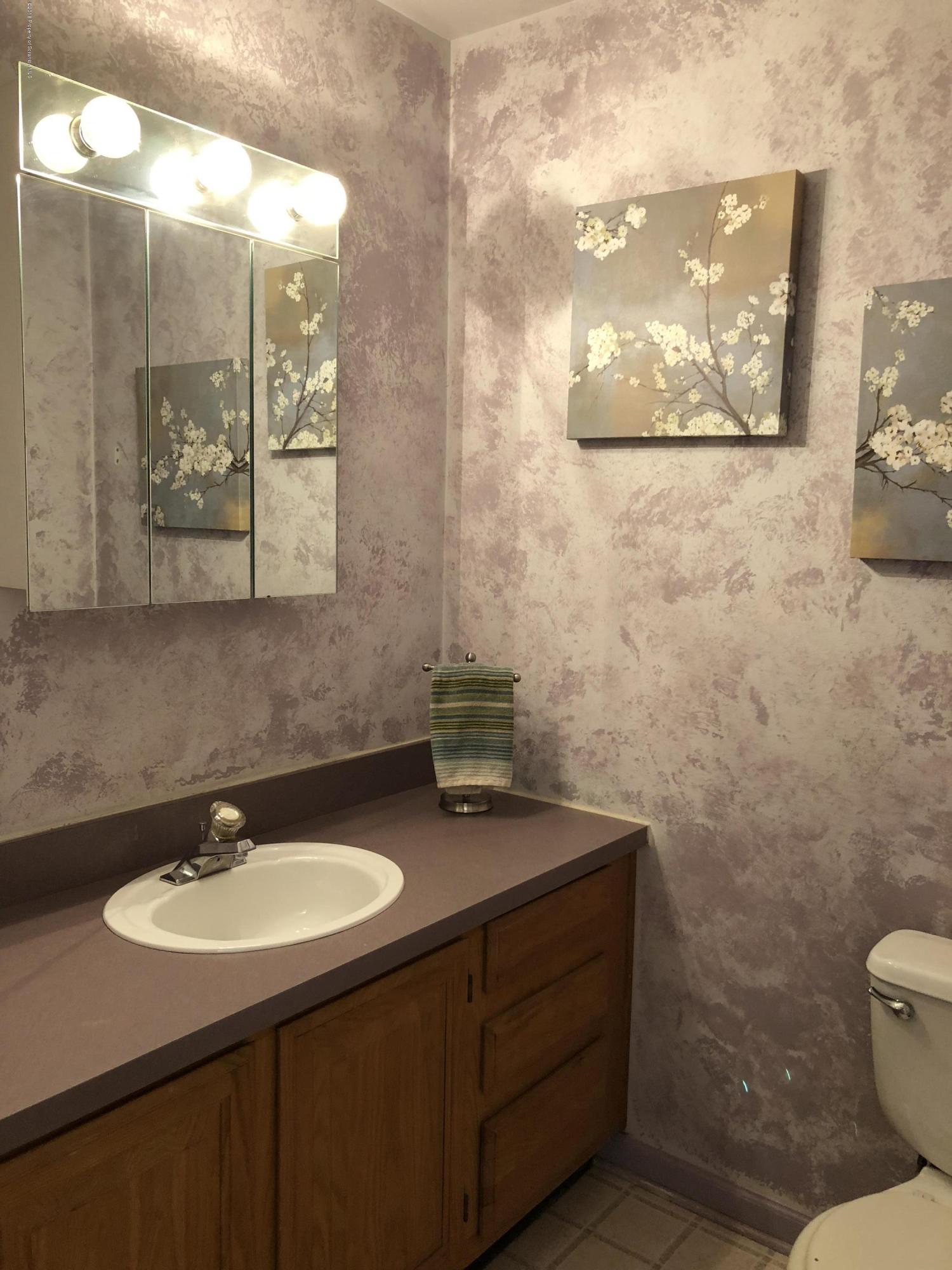 2221 Pratt Road Hop Bottom, PA 18824 - Photo 8 of 34 a bathroom with a sink vanity and toilet