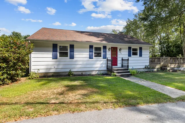 a front view of house with yard