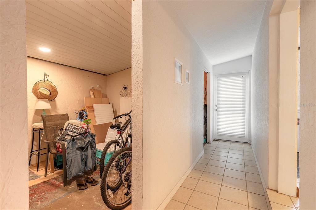 223 Charles Street Port Orange, FL 32129 - Photo 13 of 20 a view of a room with gym equipment